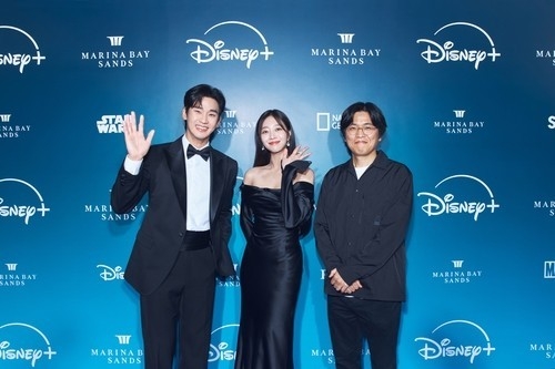 Kim Soo-hyun, Cho Bo-ah and Park Hyun-sok smile for the camera on Nov. 21, 2024. (The Walt Disney Co.)