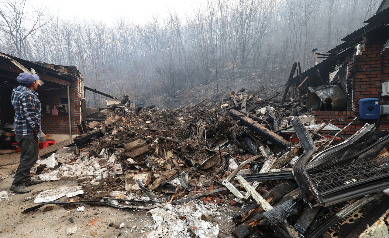 House destroyed in fire is seen on Tuesday. (Yonhap)