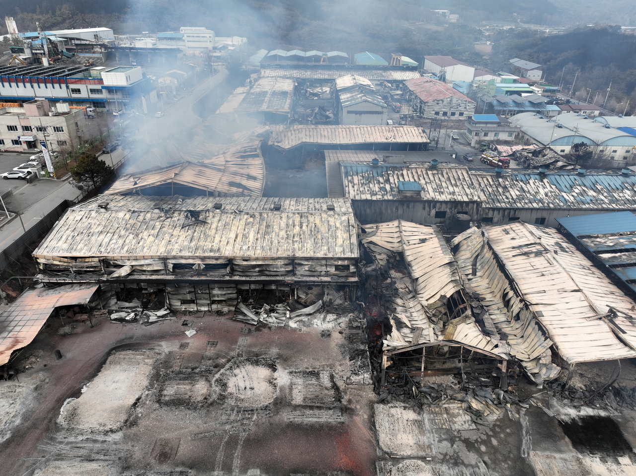 This photo taken on Friday shows a factory that burned down after wildfires swept through the southeastern city of Andong, North Gyeongsang Province, about 190 kilometers from Seoul. (Yonhap)