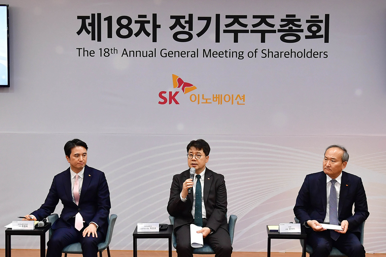 From left: SK E&S CEO Choo Hyeong-wook, SK Innovation CEO Park Sang-kyu and SK On CEO Lee Seok-hee — executives of SK Innovation — answer questions at the general meeting of SK Innovation's shareholders in Seoul, Friday. (SK Innovation)
