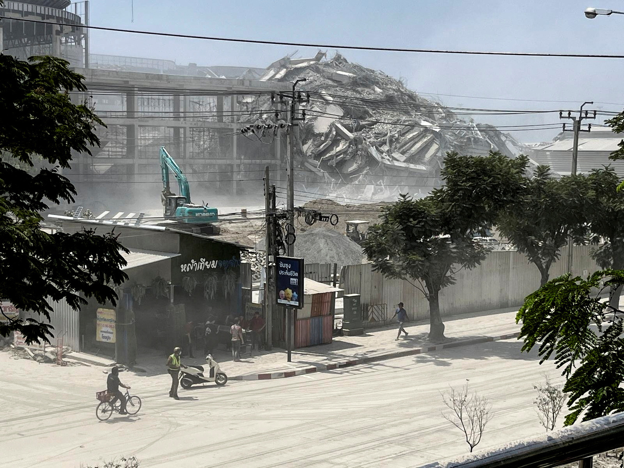 View of a collapsed building after a strong earthquake struck central Myanmar on Friday, which affected Bangkok as well with people pouring out of buildings following the tremors in the Thai capital, in Bangkok, Thailand on Friday. (Reuters-Yonhap)