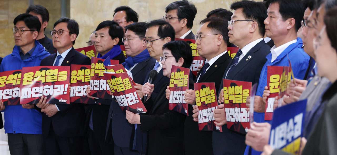 First-term lawmakers of the Democratic Party of Korea are seen holding a press conference at the National Assembly in Seoul on Friday. (Yonhap)