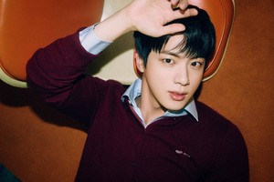 Police suspend probe of woman who kissed BTS’ Jin at hug event