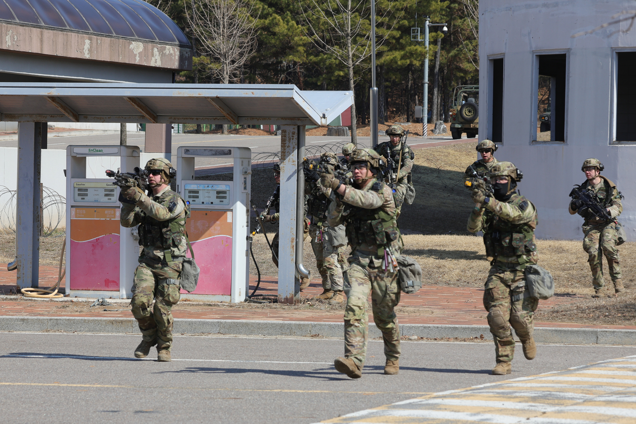 South Korean and US Army soldiers participate in a joint urban combat exercise
as part of the S. Korea-US Freedom Shield military exercise, in Paju, 37 kilometers northwest of Seoul, on March 19. Yonhap