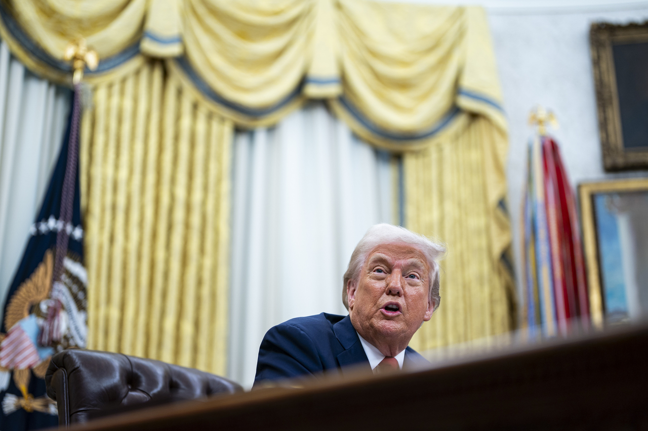 US President Donald Trump speaks during an executive order signing in the Oval Office of the White House in Washington on Monday.