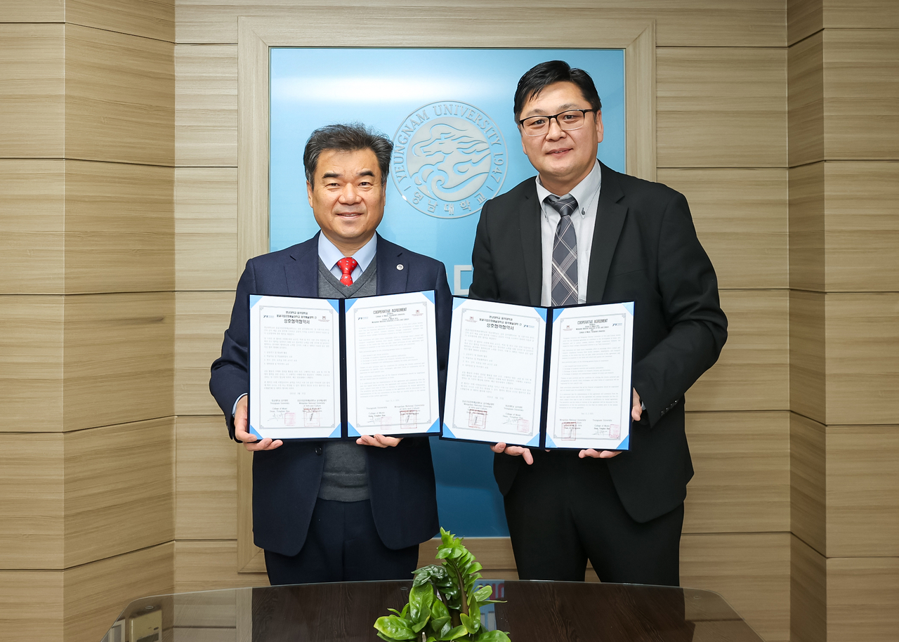 한용희 학장(왼쪽)과 체 체웩수렝 학장.[영남대 제공]