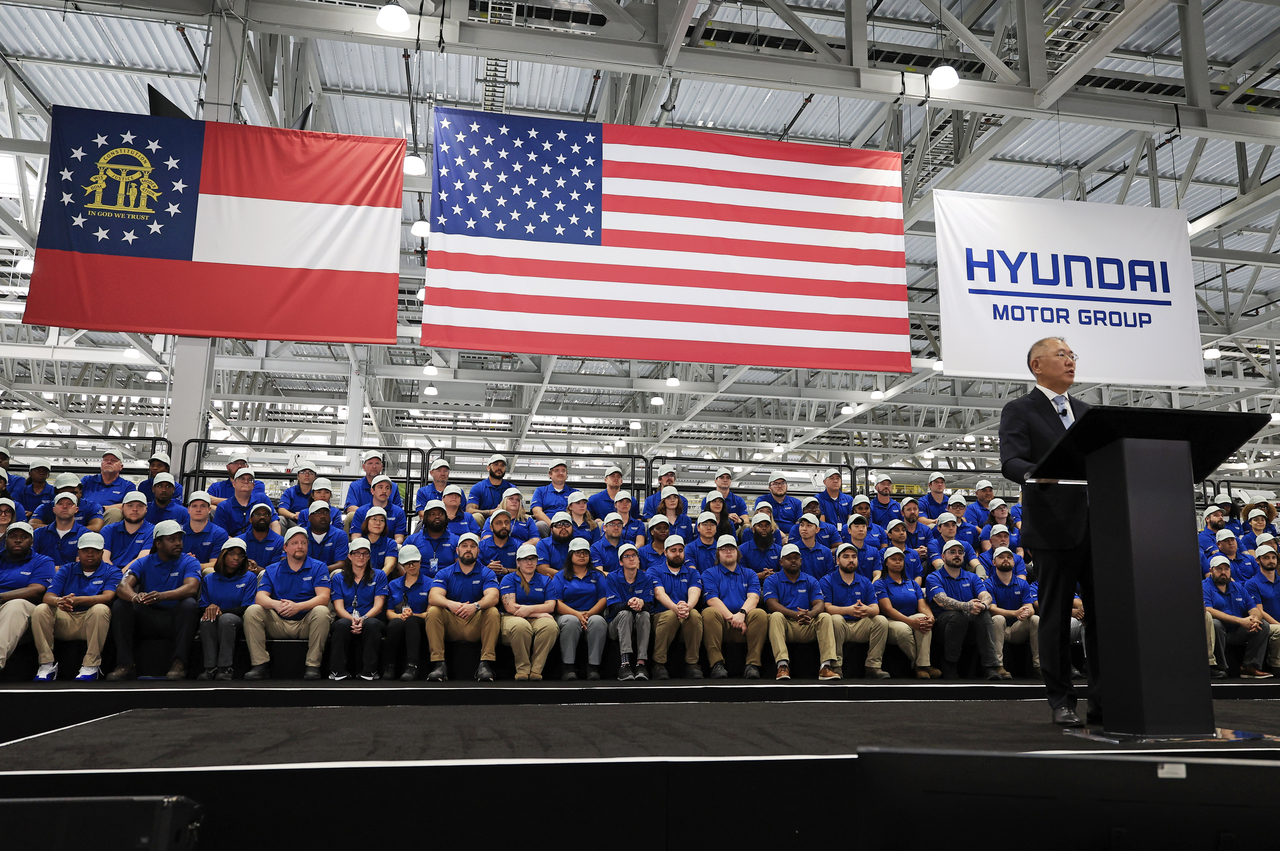 Hyundai Motor Group Executive Chairman Euisun Chung (center) speaks during a ceremony in Ellaville, the US state of Georgia, on March 26, to open the South Korean carmaker's first dedicated EV factory, Hyundai Motor Group Metaplant America. (Yonhap)
