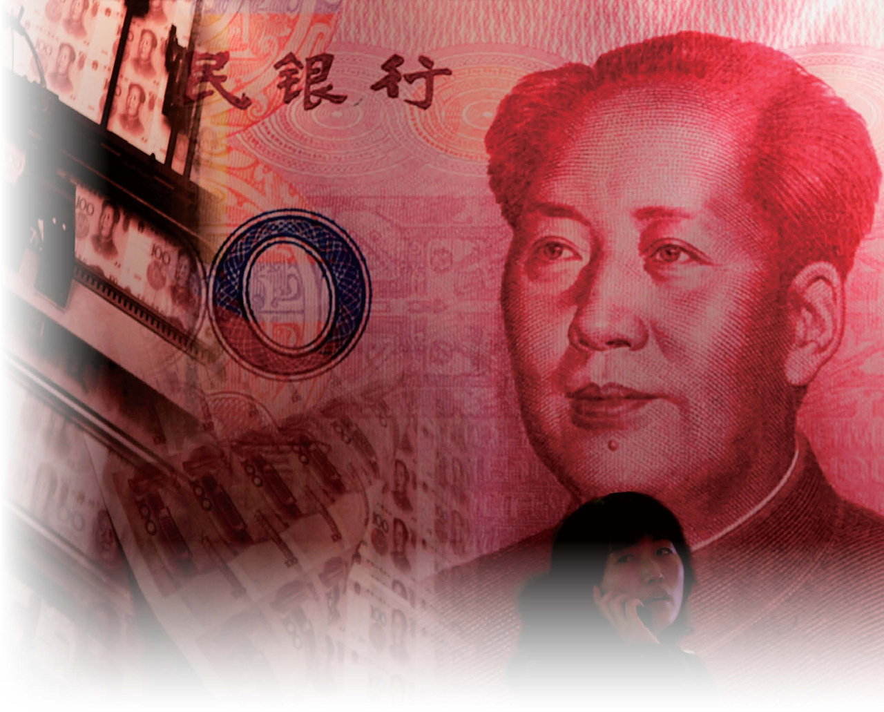 A woman stands in front of a billboard featuring the late chaiman Mao Zedong on a Chinese banknote at a finance exhibition held by the People‘s Bank of China on December 9, 2005 in Beijing, China. China’s banking regulatory body says the full opening up of its banking sector will go ahead as scheduled under WTO rules, while warning the government will no longer inject fresh capital into unprofitable banks.[Getty Images]
