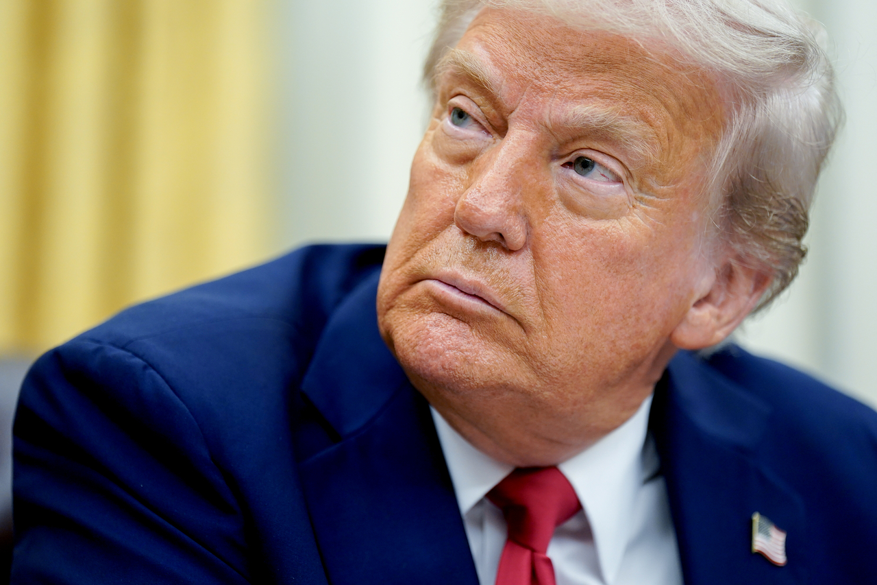 President Donald Trump looks on before signing an executive order in the Oval Office of the White House in Washington, DC on Monday. (UPI-Yonhap)