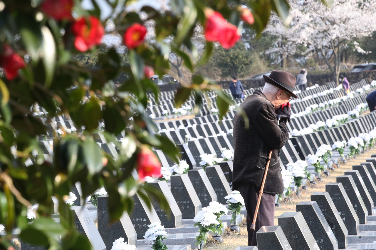 A bereaved family member visits the Jeju 4.3 Peace Park, where victims are laid to rest. (Yonhap)