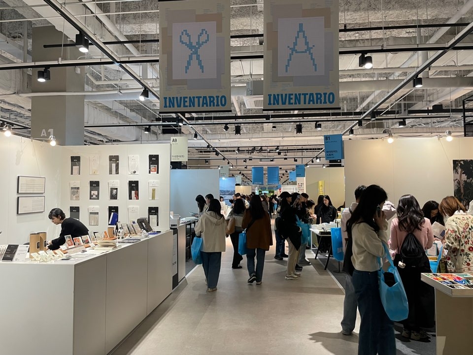 Korean stationery fair with curated notebooks, pens and paper goods on display at COEX Seoul during Inventario 2025