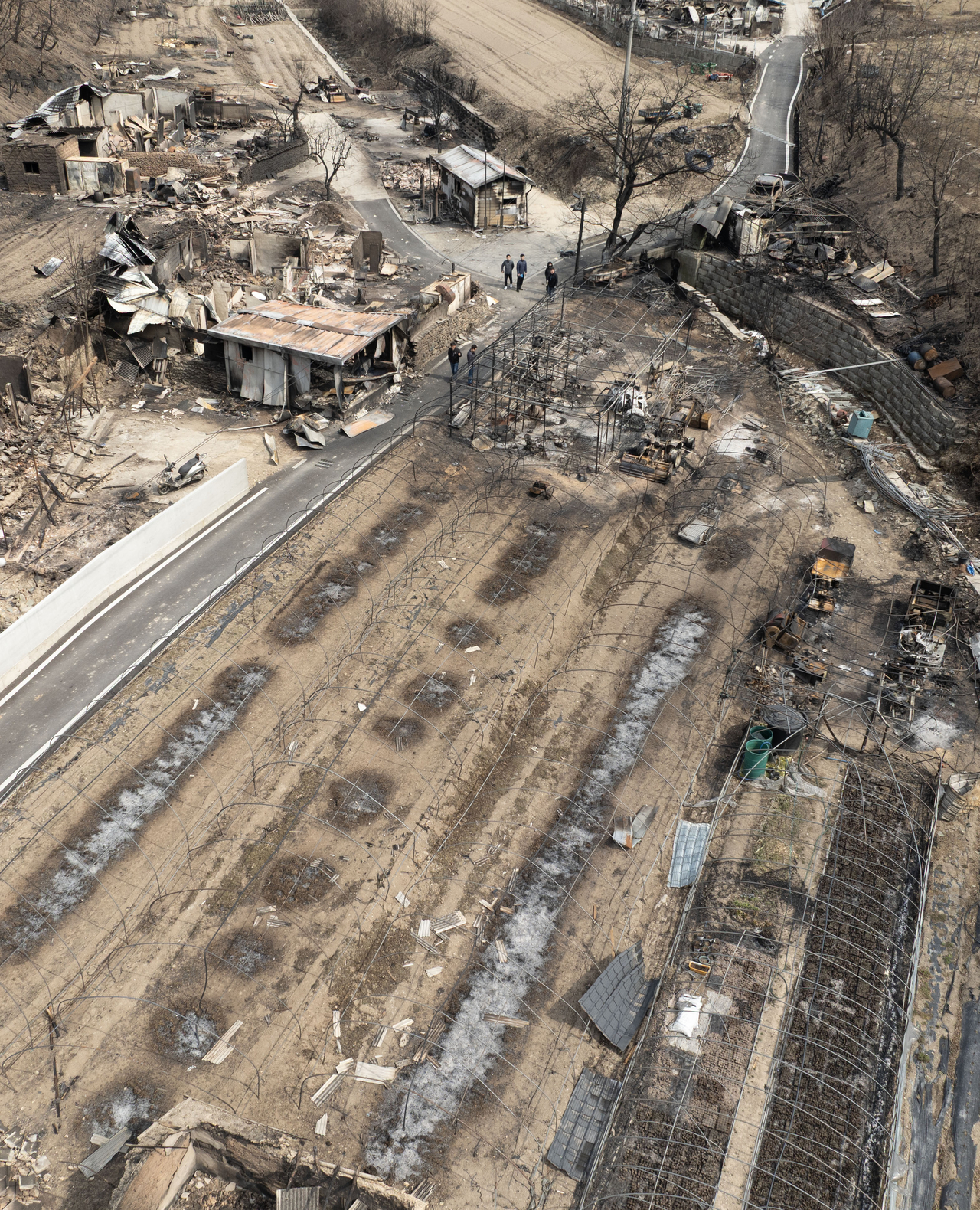An aerial view shows a village in Andong, North Gyeongsang Province, left in ruins by wildfires on Saturday. (Yonhap)