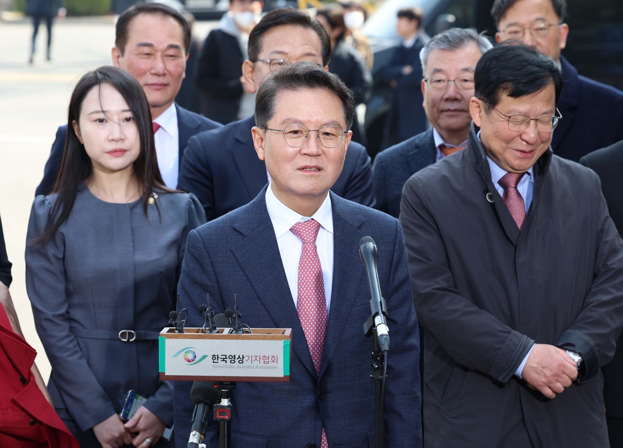 Yoon Kab-keun, legal representative for Yoon Suk Yeol speaks to the press before entering the Constitutional Court on Friday. (Yonhap)
