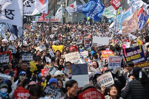 S. Korea turns page, but deep division remains
