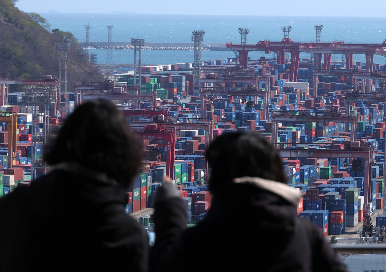 Shipping containers stacked in the container terminal at Busan Port, Thursday (Yonhap)