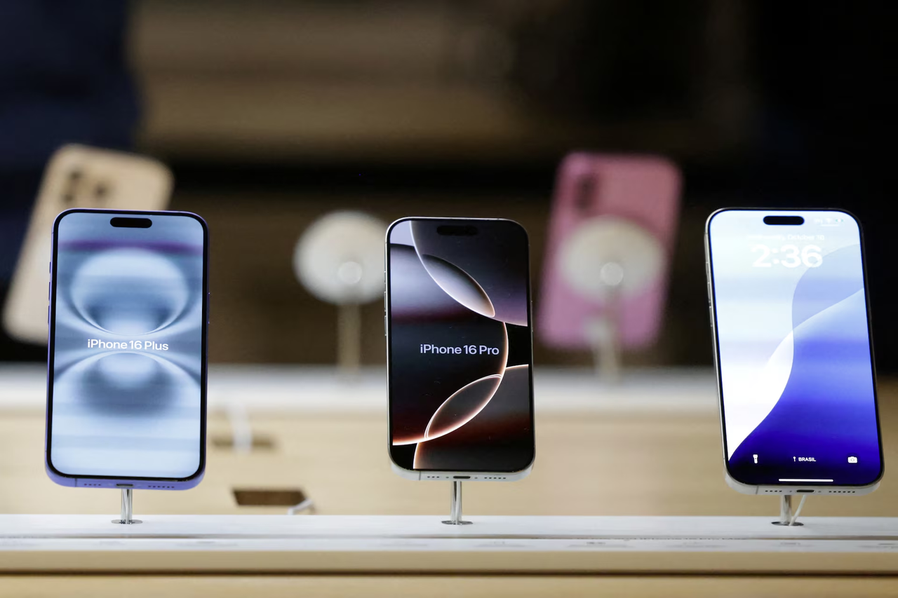 Apple iPhones displayed at an Apple Store in New York (Reuters)