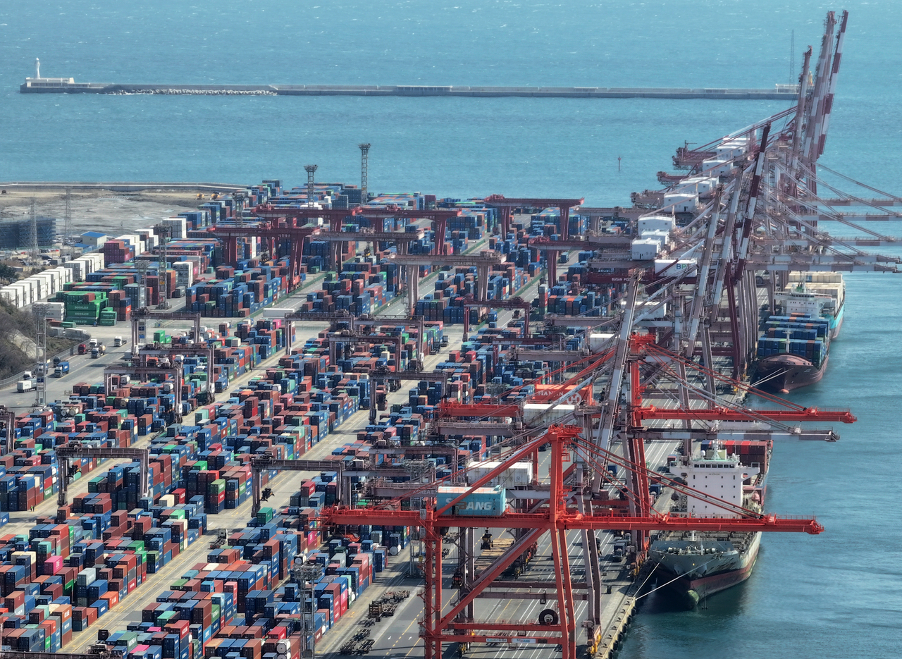 This photo taken on Thursday shows containers stacked at Busan Port in southeastern Korea, one of the key ports used for the country's exports and imports. (Yonhap)