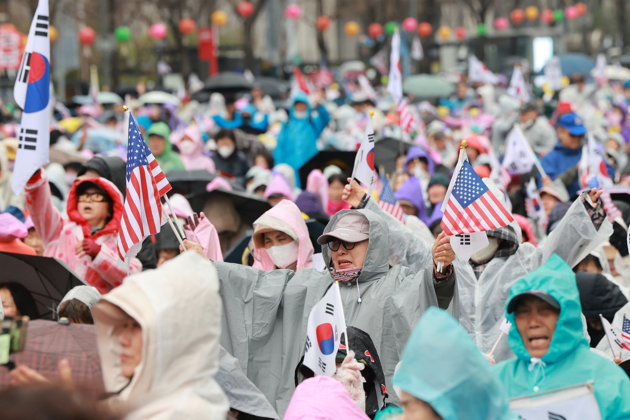 A demonstration against the Constitutional Court's decision to uphold the impeachment of ex-President Yoon Suk Yeol is held in Seoul on Saturday. (Yonhap)