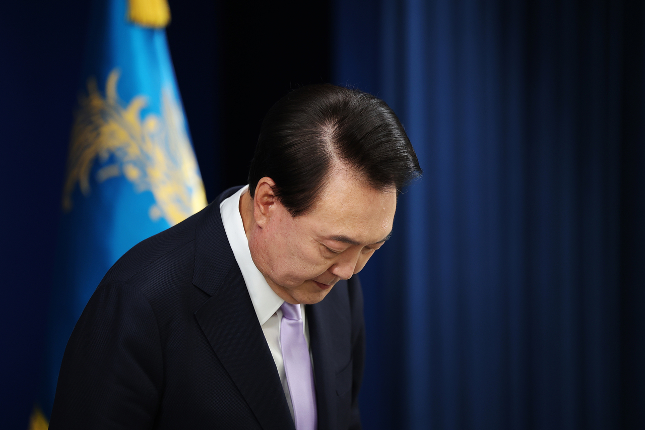 South Korean President Yoon Suk-yeol bows during a press conference on state affairs at the presidential office on November 07, 2024 in Seoul, South Korea. (Pool via Getty Images)