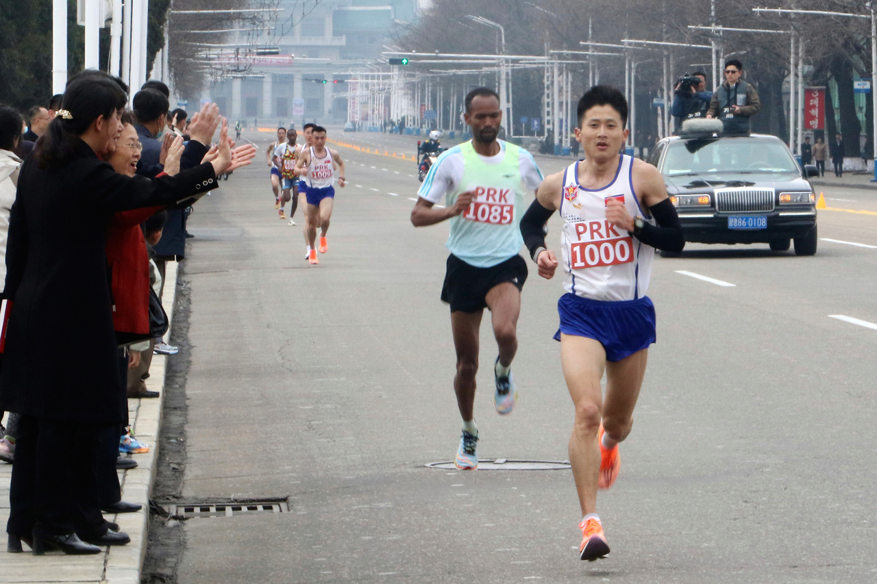 Runners take part in the Pyongyang International Marathon in Pyongyang, North Korea on Sunday. (AP-Yonhap)