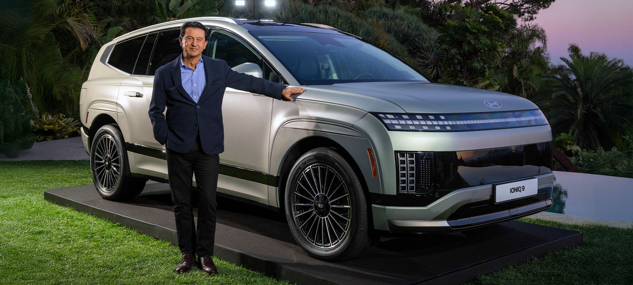 Hyundai Motor Company CEO Jose Munoz poses for a photo next to an Ioniq 9, an all-electric three-row sport utility vehicle. (Hyundai Motor Group)