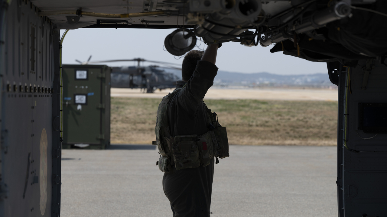 US Air Force Captain Seth Partyka, 33rd Rescue Squadron pilot, prepares to fly during Combat Search and Rescue Training Exercise 25-2 at Osan Air Base, Republic of Korea on April 7.  (US Air Force)