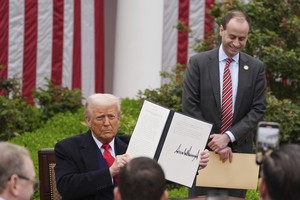 Trump signs order to review rules of US weapons exports