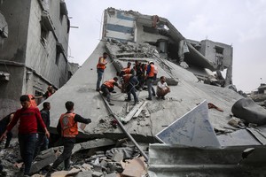 Israeli strike on Gaza apartment building kills at least 23, officials say