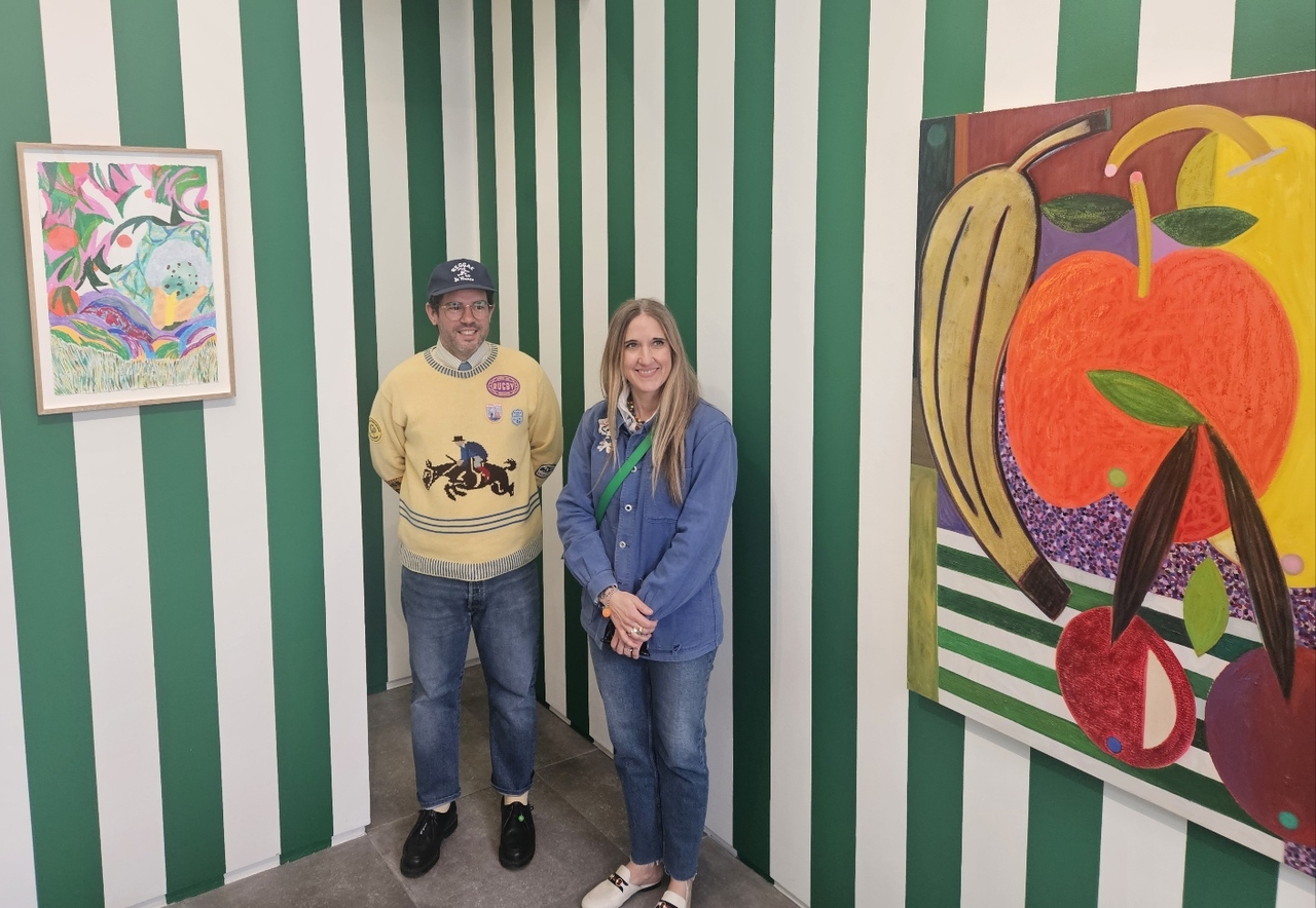 Shara Hughes (right) and Austin Eddy pose for a photo at the "Roots n’ Fruits" exhibition on Wednesday in Seoul. (Park Yuna/The Korea Herald)