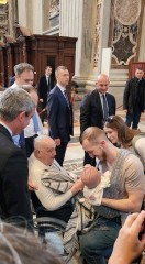 Pope makes another surprise appearance at St. Peter's, greeting restorers of papal tombs