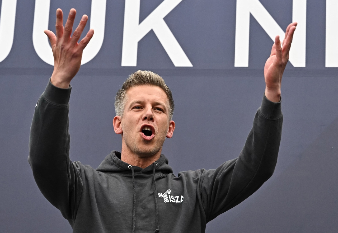 Leader of TISZA party Peter Magyar speaks during a demonstration in Budapest, Hungary, Sunday. (AFP-Yonhap)