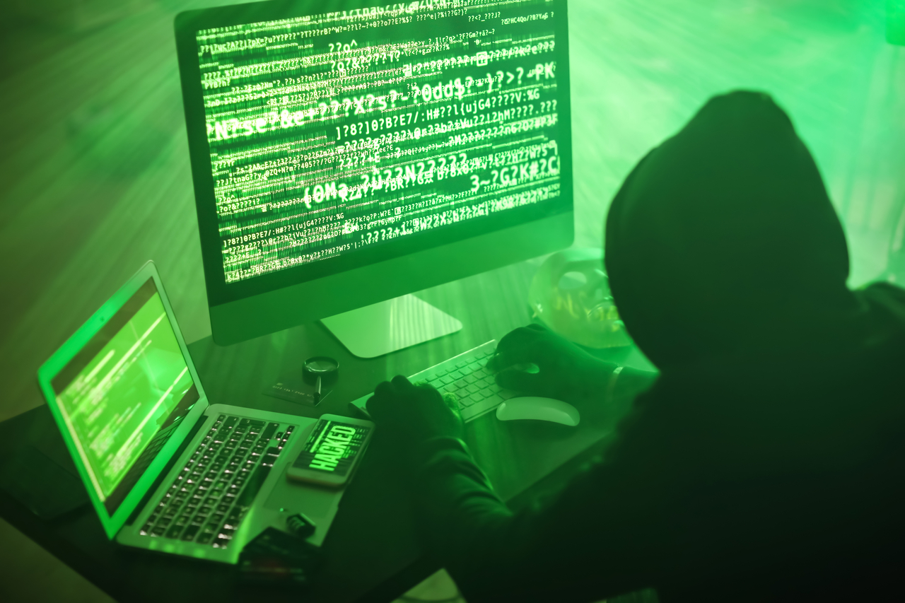 A stock image of a hacker in a hoodie (123rf)