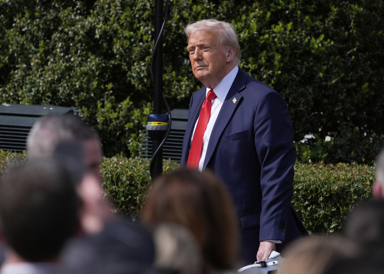 US President Donald Trump departs after welcoming the 2025 College Football National Champions, the Ohio State University football team, during an event on the South Lawn of the White House in Washington on Monday. (AP - Yonhap)