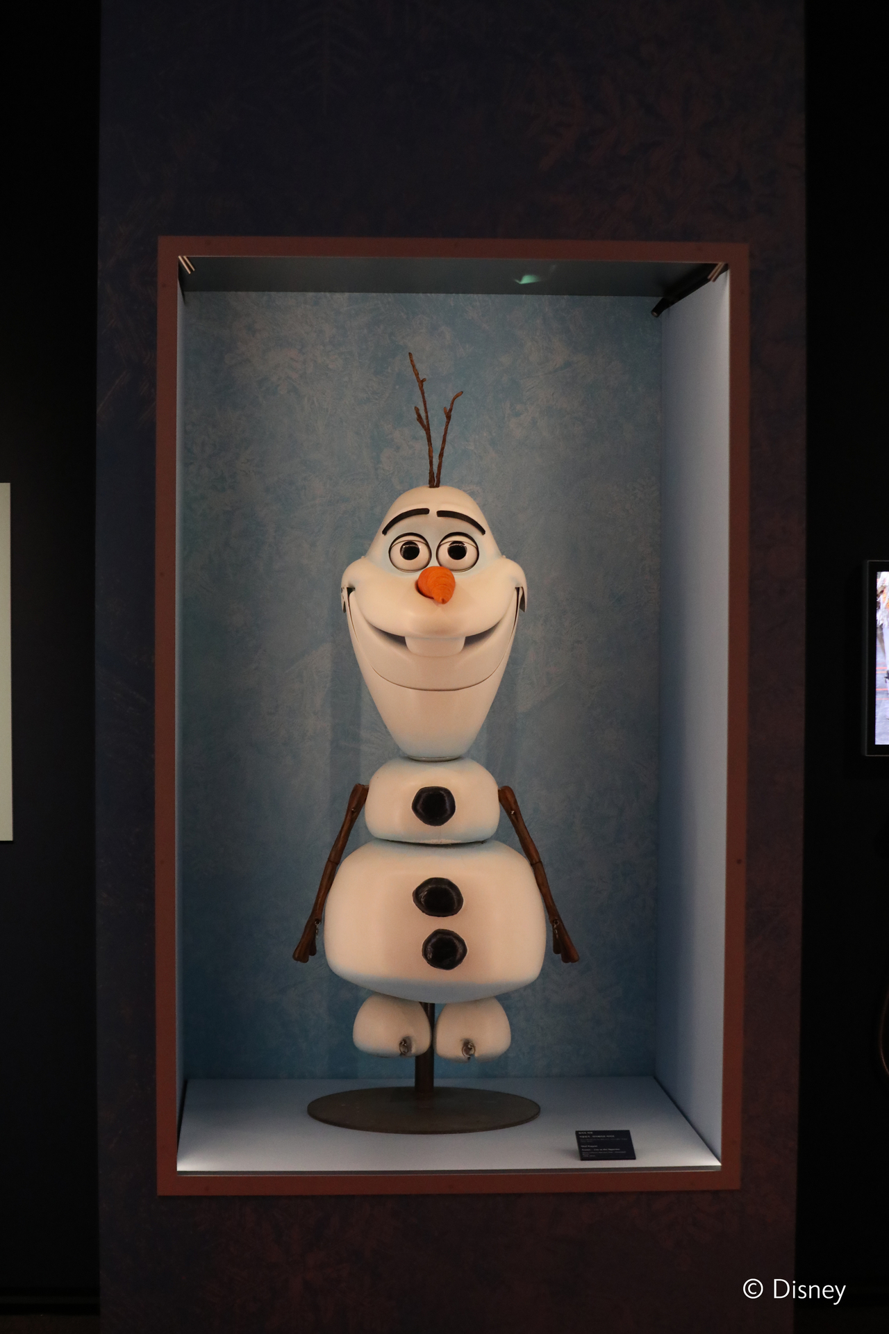 Olaf, a character in Disney's mega-hit "Frozen," is displayed at the "Disney 100 The Exhibition" (Disney)