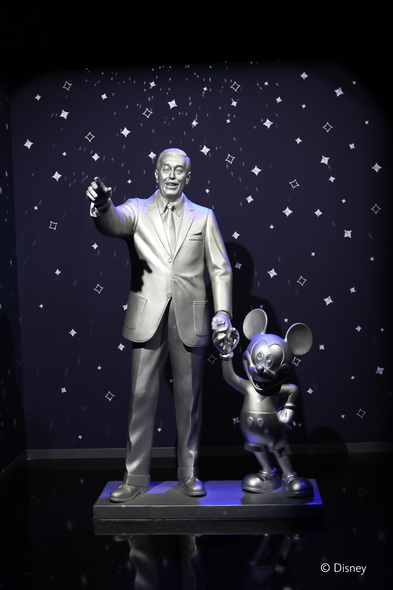 Walt Disney and Mickey Mouse are displayed at the "Disney 100 The Exhibition" in Seoul. (Disney)
