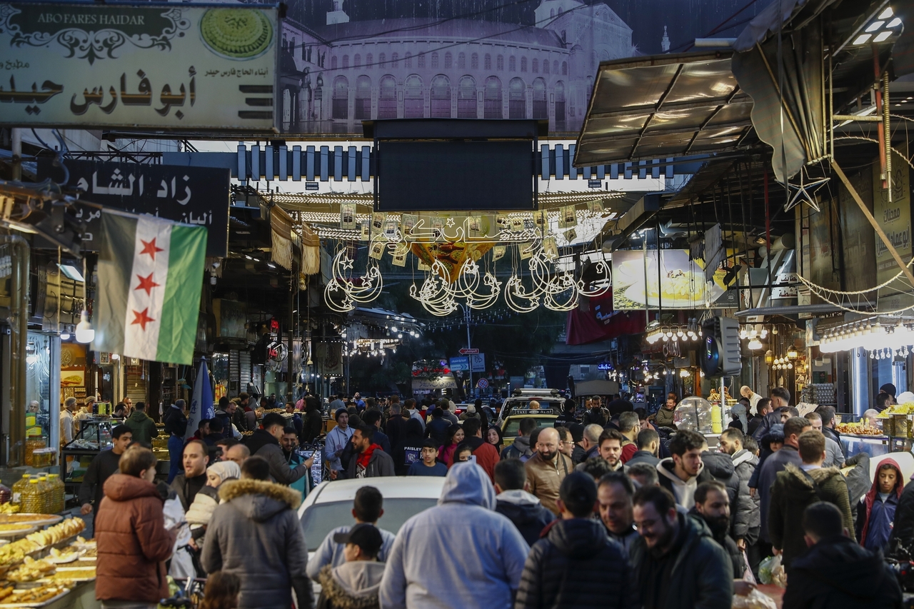 Residents walk in the market on the first day of Ramadan, the holy month for Muslims, in the old city of Damascus, Syria, Saturday March 1, 2025. (File Photo
- AP)