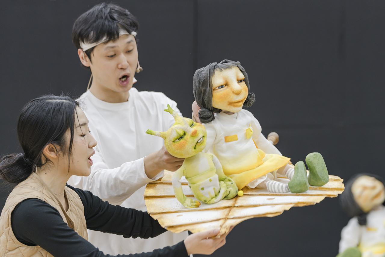 Performers rehearse a scene from "Shinnarak Mannarak" at the National Theater of Korea on Monday. (National Orchestra of Korea)