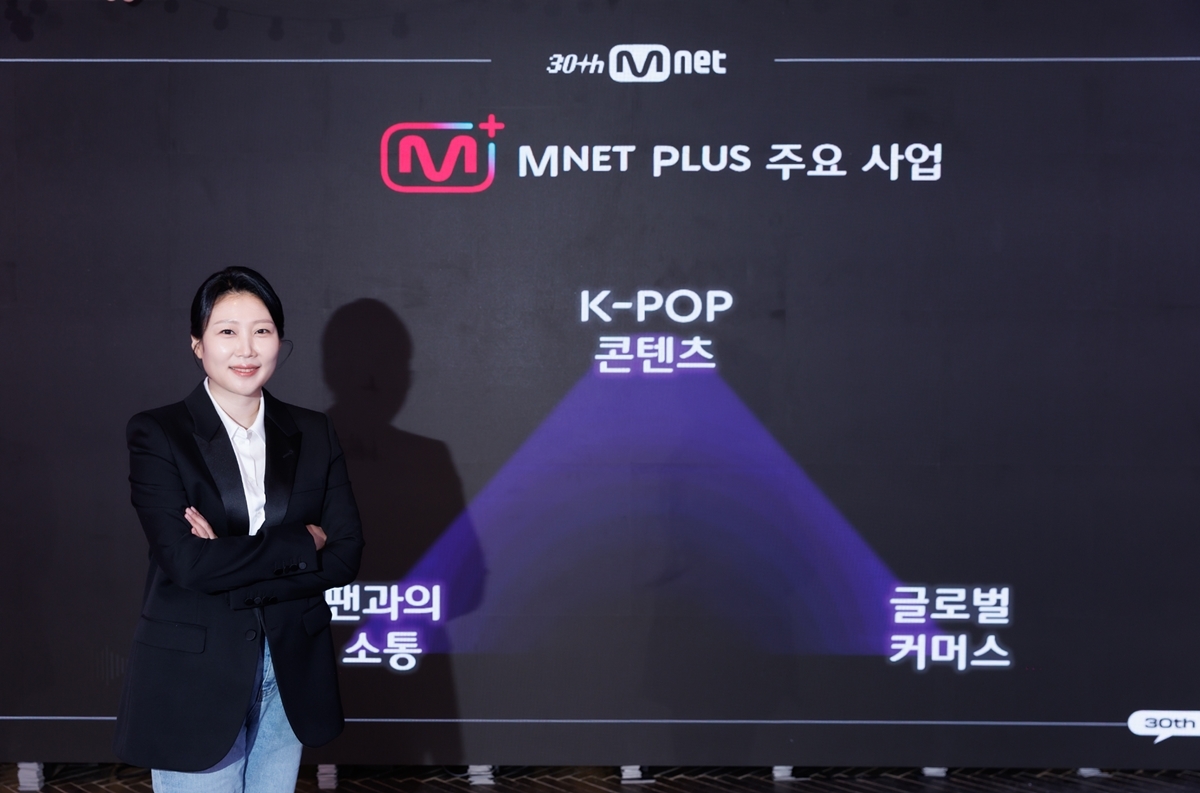 Kim Ji-won, head of Mnet Plus, poses during a press conference held at the CJ ENM Music Media Lounge in Gangnam-gu, Seoul, Tuesday.