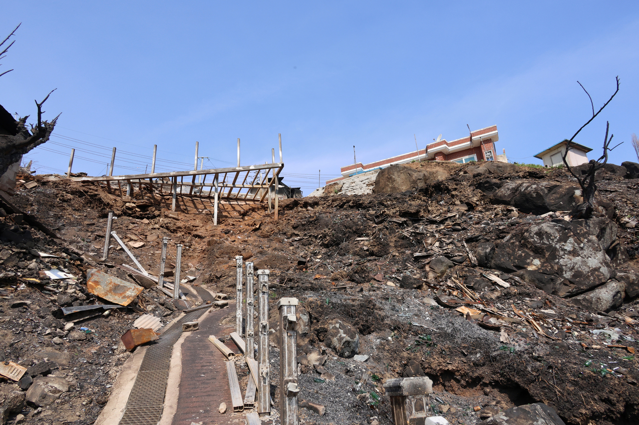 A village in Yeongdeok, North Gyeongsang Province, is damaged after wildfires. (Yonhap)