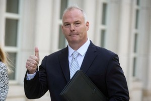 Former New York police sergeant sentenced to 1 1/2 years in prison for acting as Chinese agent