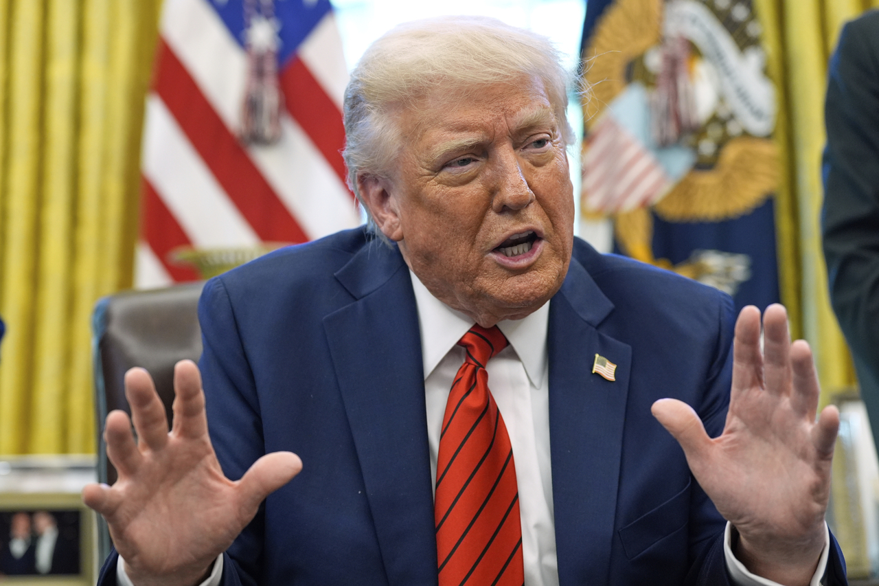 US President Donald Trump speaks as he signs executive orders in the Oval Office of the White House in Washington on Thursday. (AP - Yonhap)