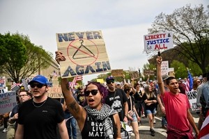 Anti-Trump protesters rally in New York, Washington and communities across US