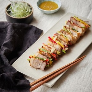 30. Bossam (boiled pork belly wraps)