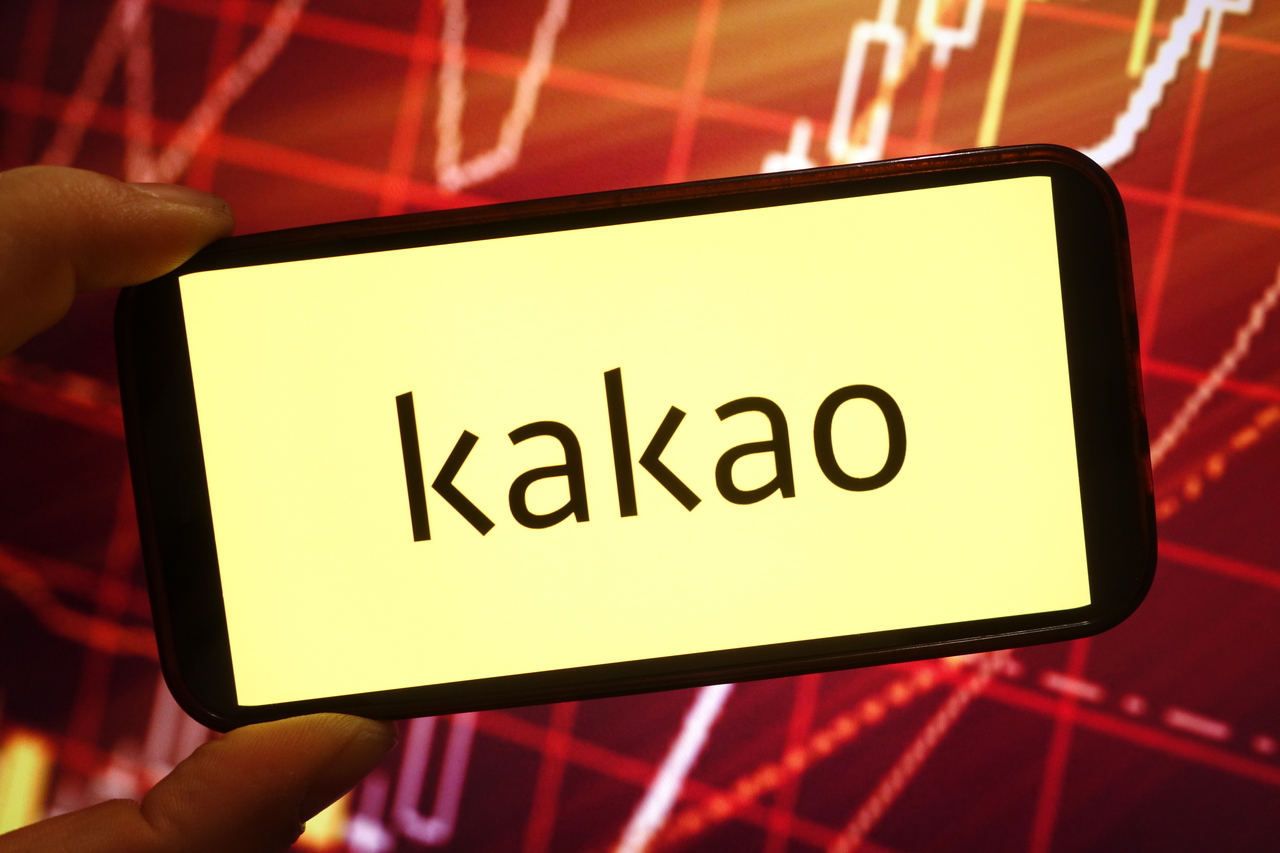 In this photo illustration, the Kakao Corporation company logo is seen displayed on a smartphone screen. (Getty Images)