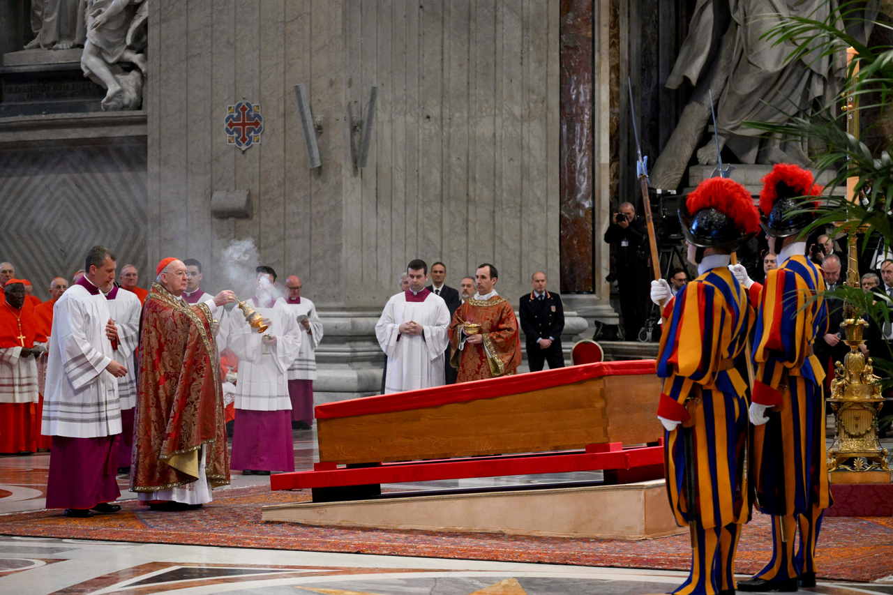Cardinal Camerlengo Kevin Joseph Farrell swings a thurible of incense as Pope Francis's body rests inside his coffin, on the day of the translation of his body, in St. Peter's Basilica at the Vatican, Wednesday. (Reuters)