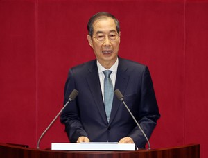 Acting president seeks swift passage of extra budget proposal in speech to parliament