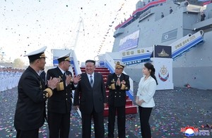 North Korea unveils new destroyer, pledges to strengthen naval power