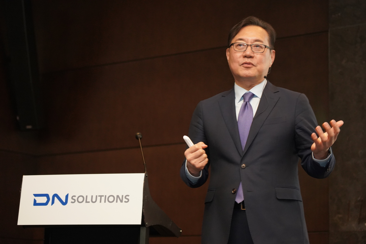 DN Solutions CEO Kim Won-jong speaks in a press conference at the Conrad Seoul on Friday. (DN Solutions)
