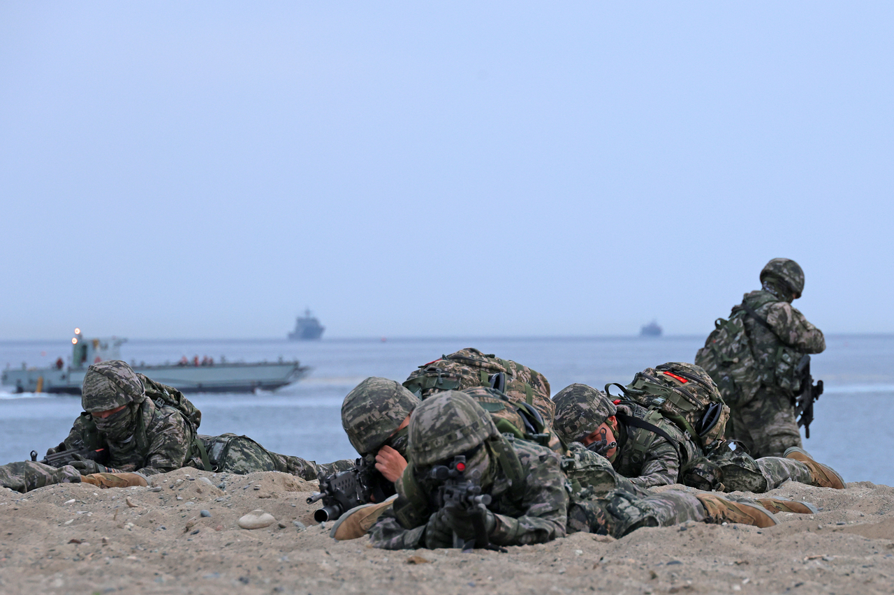 Marines take part in amphibious landing drills at a beach in Pohang, about 270 kilometers southeast of Seoul, on Monday. (Yonhap)