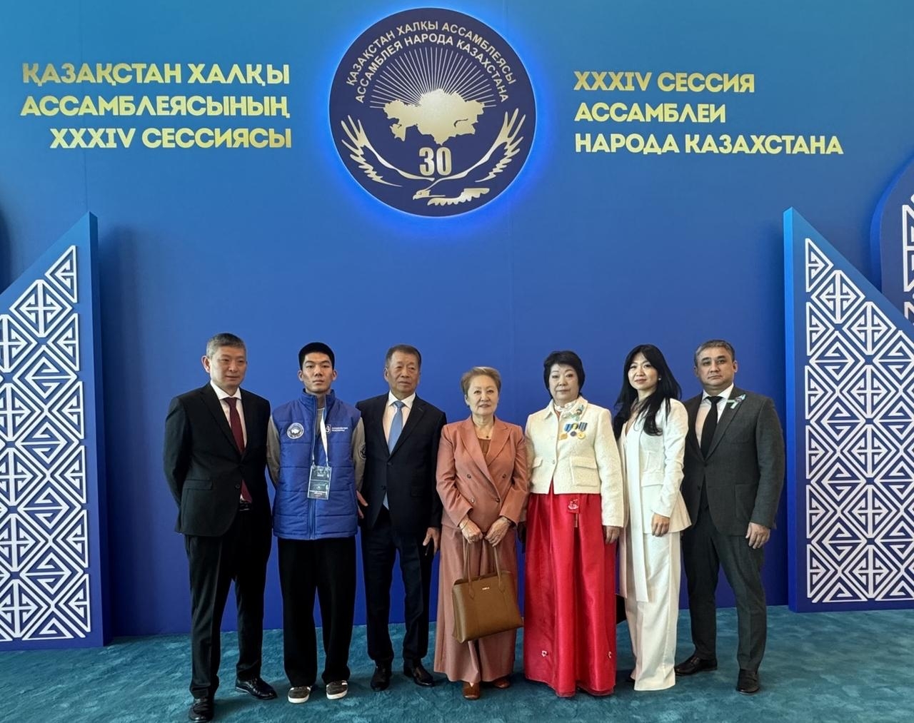 Attendees pose for a group photo ahead of the 34th session of the Assembly of the People of Kazakhstan at Palace of Independence in Astana, the capital city of Kazakhstan on Thursday (From the right) Yuri Shek, Chairman of the Association of Koreans of the Aktobe Region; Natalia Lee, Chief Ballet Master of the State Republican Academic Korean Theater; Lyudmila Lee, Chairperson of the Ethnocultural Association of Koreans of the Atyrau Region; Lyubov Ni, Artistic Director of the State Republican Academic Korean Theater; Roman Kim, Member of the Board of Trustees of the Association of Koreans of Kazakhstan; Denis Kim, Volunteer of the Assembly of the People of Kazakhstan; Konstantin Kim, Editor-in-Chief of the newspaper Koryo Ilbo. (Sanjay Kumar/ The Korea Herald)